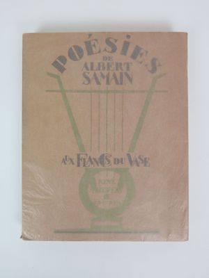 un livre marron avec une image de guitare dessus