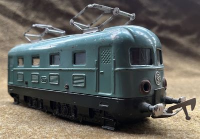a toy train that is sitting on the ground