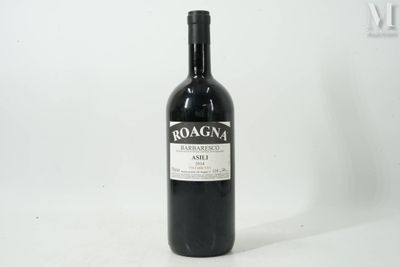 a bottle of wine that is sitting on a table