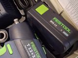 two electric tools that are sitting on top of a box