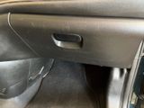 a close up of the inside of a car door handle