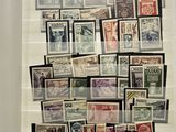 a picture of a display of stamps in a glass case