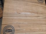 several pieces of wood are stacked on top of each other on a table