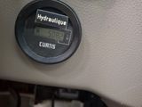 a close up of a digital meter on a car