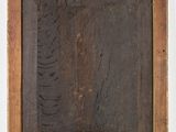a painting of a fern leaf in a wooden frame on a white wall