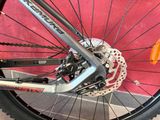 a close up view of a bicycle ' s front wheel