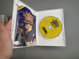 a person holding a dvd in their hand
