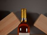 a bottle of wine that is sitting on a table