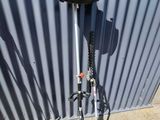 a scooter that is sitting against a wall