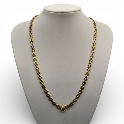 Collier en or jaune et gris (750 millièmes) à maillons alter…