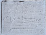 an image of a stone plaque with a boat on it