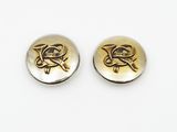 two gold and silver buttons with a dragon on them