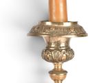 an image of a candle holder with a candle on top of it
