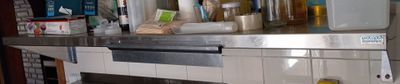 an image of a kitchen with a stove and a microwave