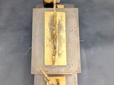 a picture of a metal object on a metal surface