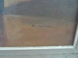 a picture of a painting on the window sill of a building