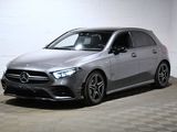la mercedes cla est garée dans un garage dont le sol est recouvert de carreaux