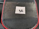 a person standing on a tread machine with a sticker on the seat