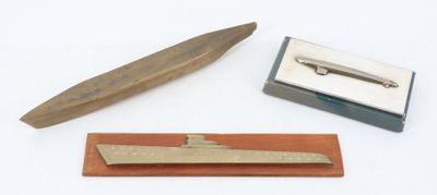 un petit couteau et une boîte sur laquelle est représenté un petit couteau