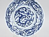 chinese blue and white plate with a dragon design