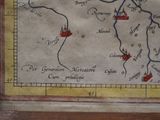 a picture of a map on a wall in a room
