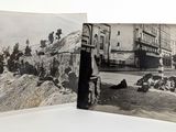 une vieille photo en noir et blanc montrant un groupe de soldats allongés par terre