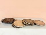 a pile of coins sitting on top of a table