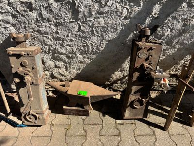 a lot of old tools that are sitting on the ground