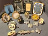 a lot of antique items that are on a table