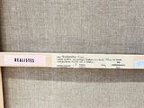 a picture of a close up of a chair with a label on it