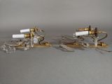 pair of antique brass and crystal sconces