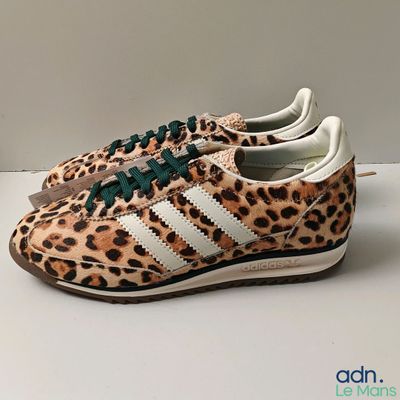 leopard print adidas sneakers with green laces and white soles