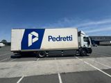 a white truck that is parked in a parking lot