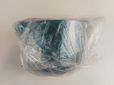 a plastic bowl that is wrapped in plastic on a table