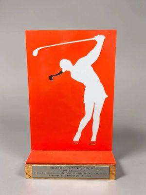 a red plaque with a white silhouette of a man swinging a golf club