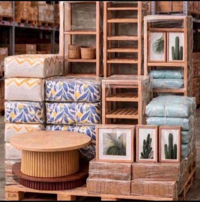 a display of various items in a store with pictures on the shelves
