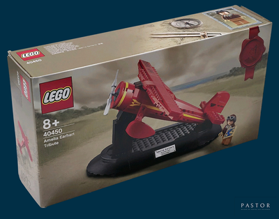 a box of legos with a red plane in it