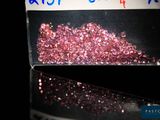 a box of pink glitter sitting on top of a table