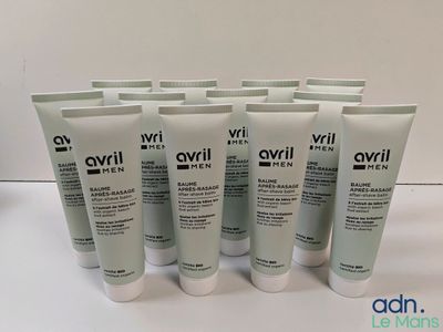 a group of five bottles of avrill skin care sitting on a table