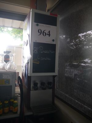 a machine that is sitting in the corner of a room
