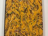 an abstract painting on a yellow surface with black and green paint