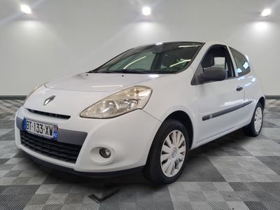 a picture of a white car parked in a garage