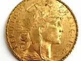 l'image d'une pièce d'or sur laquelle figure une tête de femme