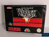 La boîte du jeu Nintendo « Warlock » est posée sur une table.