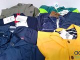 a pile of clothing that is sitting on a table
