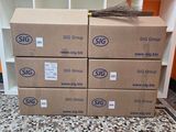 several boxes stacked on top of each other in a room