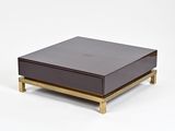 une photo d'une table basse avec un plateau en bois et des pieds en métal