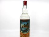 an image of a bottle of alcohol sitting on top of a table