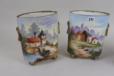 two vases that have been painted on the outside of them