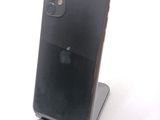 an image of a close up of a cell phone on a stand